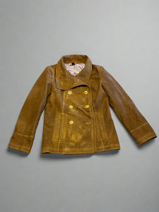 Brown jacket on a textured gray surface